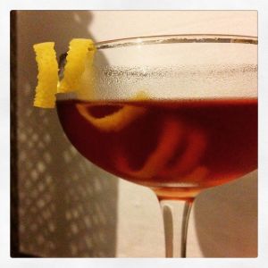 An image of the Koyo cocktail submitted by n0tquitethere that contains Sake, Dubonnet Rouge, Cynar, Yellow Chartreuse, St Germain and Lemon