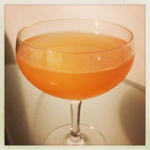 An image of the Little Bit Country cocktail submitted by Toby that contains Bourbon, Lemon, Maple Syrup, Maraschino Liqueur, Jalapeno Pepper, Angostura Bitters, Orange Bitters and Orange