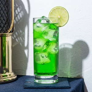 An image of the Long Island Iced Tea cocktail submitted by Toby that contains Plain Vodka, London Dry Gin, Blanco Tequila, White Rum, Crème de Menthe, Lemon, Simple Syrup, Coca-Cola and Lime