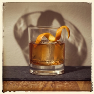 An image of the Long Snake Moan cocktail submitted by Toby that contains Reposado Tequila, Averna, Arrack, Agave Syrup, Angostura Bitters, Xocolatl Mole Bitters and Orange