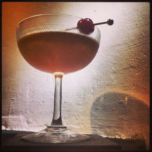 An image of the Made Man cocktail submitted by Toby that contains Rye Whiskey, Cherry Heering, Yellow Chartreuse, Fernet Branca and Cocktail Cherry