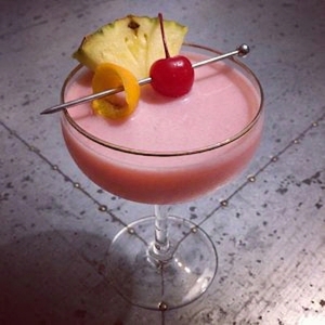 An image of the Mai Tai cocktail submitted by Toby that contains White Rum, Dark Rum, Curaçao Triple Sec, Lime, Orgeat Syrup, Grenadine, Cocktail Cherry, Pineapple and Orange