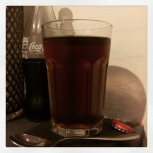 An image of the Milk Punch cocktail submitted by Toby that contains Brandy, Dark Rum, Simple Syrup, Vanilla Extract and Milk