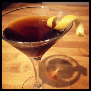 An image of the Night Porter cocktail submitted by Toby that contains Bianco Vermouth, Absinthe, LBV Port, Mezcal and Lemon