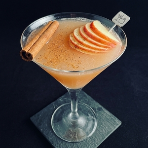 An image of the Nouveau Sangaree cocktail submitted by Toby that contains Beaujolais Nouveau, Apple Brandy, Plymouth Sloe Gin, Maple Syrup, Angostura Bitters, Apple and Cinnamon