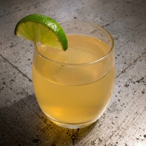 An image of the Old San Juan Sour cocktail submitted by Toby that contains Gold Rum, Lime, Cranberry Juice, Simple Syrup and Lime
