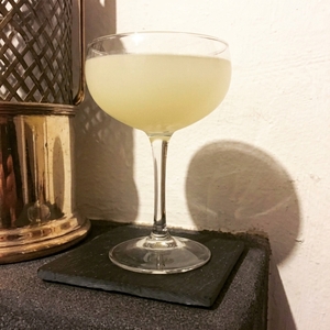 An image of the Peach Daiquiri cocktail submitted by Toby that contains Lime, Rum, Agave Syrup and Peach Purée