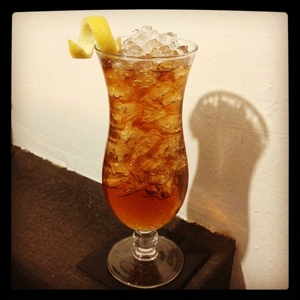 An image of the Plastic Passion cocktail submitted by Toby that contains Agricole Rhum, Lillet Blanc, Passion Fruit Juice, Absinthe, Orange Flower Water, Angostura Bitters and Lemon