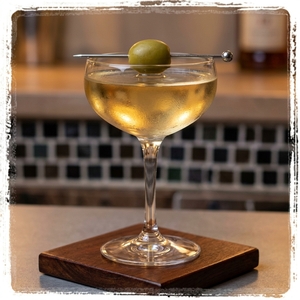 An image of the Port Authority cocktail submitted by Toby that contains LBV Port, Apple Brandy, Yellow Chartreuse and Olive