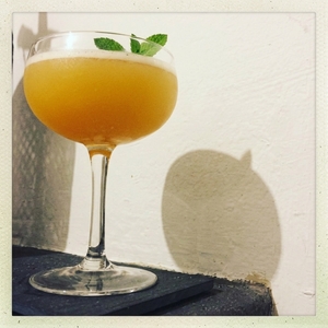 An image of the Quaker cocktail submitted by Toby that contains Rye Whiskey, Cognac, Lemon, Simple Syrup and Raspberries