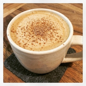 An image of the Rum Raisan Toddy cocktail submitted by Toby that contains Dark Rum, Spiced Raisin Syrup, Lemon, Water and Nutmeg
