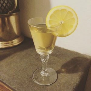 An image of the Saratoga Cocktail cocktail submitted by Toby that contains Whiskey, Brandy, Sweet Vermouth and Lemon