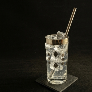 An image of the Sargasso Sea cocktail submitted by Toby that contains Cruzan Blackstrap Rum, Cynar, Pineapple, Lime, Raspberry Syrup and Soda Water