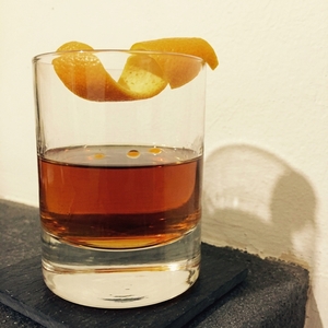 An image of the Saucy Sue cocktail submitted by Toby that contains Cognac, Applejack, Absinthe, Apricot Brandy and Orange