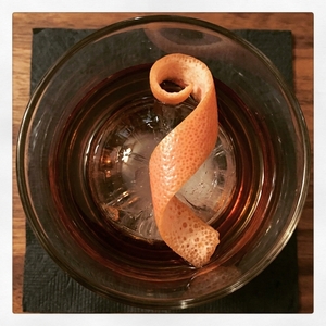 An image of the Sneaky Pete cocktail submitted by Toby that contains Bourbon, Turin Bitters, Sweet Vermouth, Grapefruit, Rosemary and Grapefruit