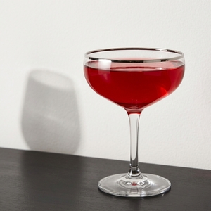 An image of the Something Fruity, Not Too Strong cocktail submitted by Toby that contains Grenadine, Lemon, St Germain and Sparkling Wine