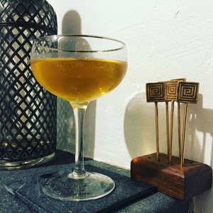 An image of the St Lawrence cocktail submitted by Toby that contains Angostura Bitters, Grand Marnier, Bourbon, Rye Whiskey and Dry Vermouth