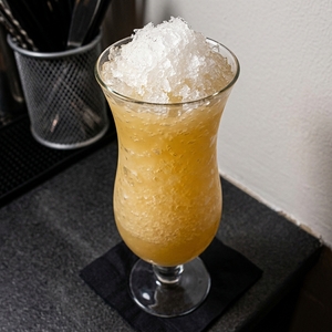 An image of the Stranger Than Paradise cocktail submitted by Toby that contains White Rum, Amaro Montenegro, Passion Fruit Syrup, Lemon and LBV Port