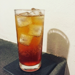 An image of the Summer Tea cocktail submitted by Toby that contains Peppermint Tea, Caster Sugar, Mint, Lemon and London Dry Gin