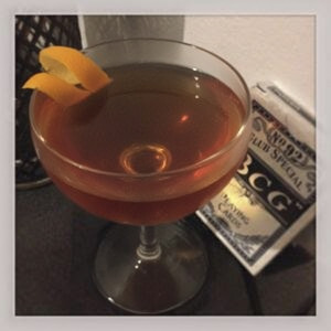 An image of the Teagroni cocktail submitted by Toby that contains London Dry Gin, Sweet Vermouth, Tea, Honey and Orange