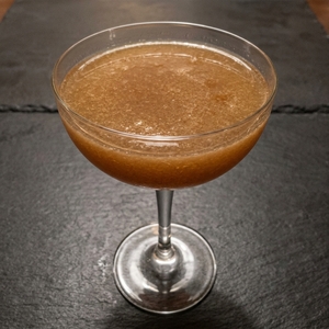 An image of the The Avenue cocktail submitted by Toby that contains Bourbon, Apple Brandy, Passion Fruit Juice, Grenadine and Orange Flower Water