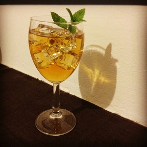 An image of the The Bacchanalian cocktail submitted by Toby that contains Dry Red Wine, Cognac, Lemon and Agave Syrup