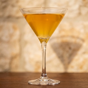 An image of the The Bonny Scott cocktail submitted by Toby that contains Blended Scotch, Drambuie, Apple Brandy and Passion Fruit Syrup