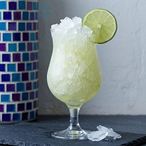 An image of the The Commandant cocktail submitted by Toby that contains Navy Strength Gin, Swedish Flaggpunsch, Falernum, Lime, Coco Lopez, Kaffir Lime Leaves and Lime