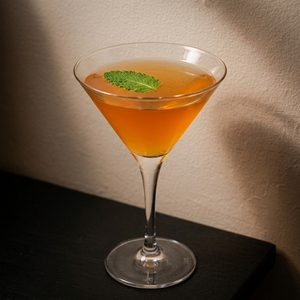 An image of the The Derby Cocktail cocktail submitted by Toby that contains Bourbon, Sweet Vermouth, Curaçao Triple Sec, Lime and Mint