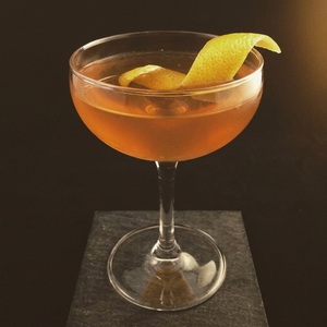 An image of the The French Province cocktail submitted by Toby that contains Agricole Rhum, Calvados, Bianco Vermouth, Gran Classico Bitter, Fee Brothers Whiskey Barrel Aged Bitters and Lemon