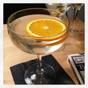 An image of the The Income Tax Cocktail cocktail submitted by Toby that contains London Dry Gin, Dry Vermouth, Sweet Vermouth, Orange, Orange and Angostura Bitters