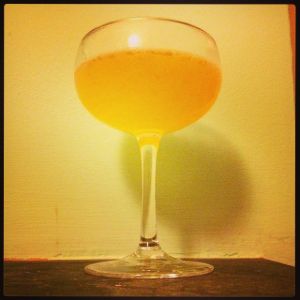 An image of the The Sheik cocktail submitted by n0tquitethere that contains Blended Scotch, Bianco Vermouth, Swedish Flaggpunsch and Orange
