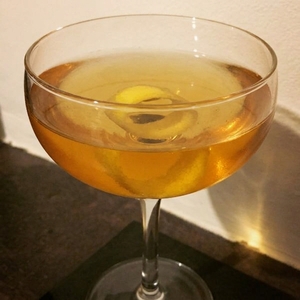 An image of the Trident cocktail submitted by Toby that contains Aquavit, Manzanilla Sherry, Cynar, Peach Bitters and Lemon
