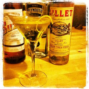 An image of the White Negroni cocktail submitted by n0tquitethere that contains London Dry Gin, Lillet Blanc, Suze and Lemon