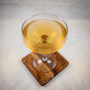 An image of the Whiz Bang Cocktail cocktail submitted by Toby that contains Blended Scotch, Dry Vermouth, Absinthe, Orange Bitters and Grenadine