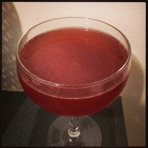 An image of the Winberry cocktail submitted by Toby that contains Bourbon, Amer Picon, Lemon, Orange, Orange Bitters and Grenadine